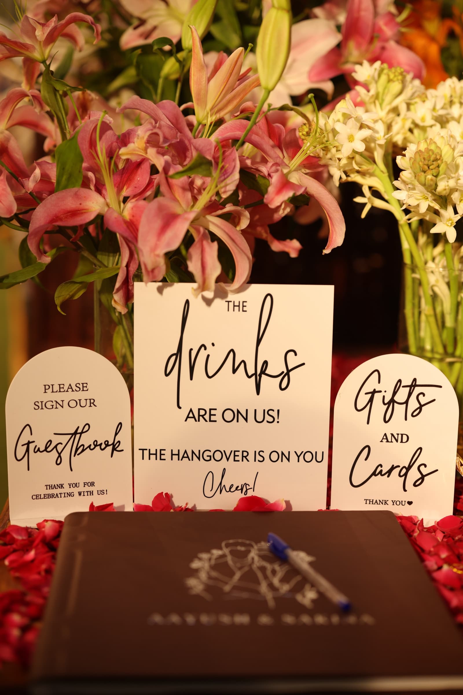 Guestbook, drinks, and gifts signage