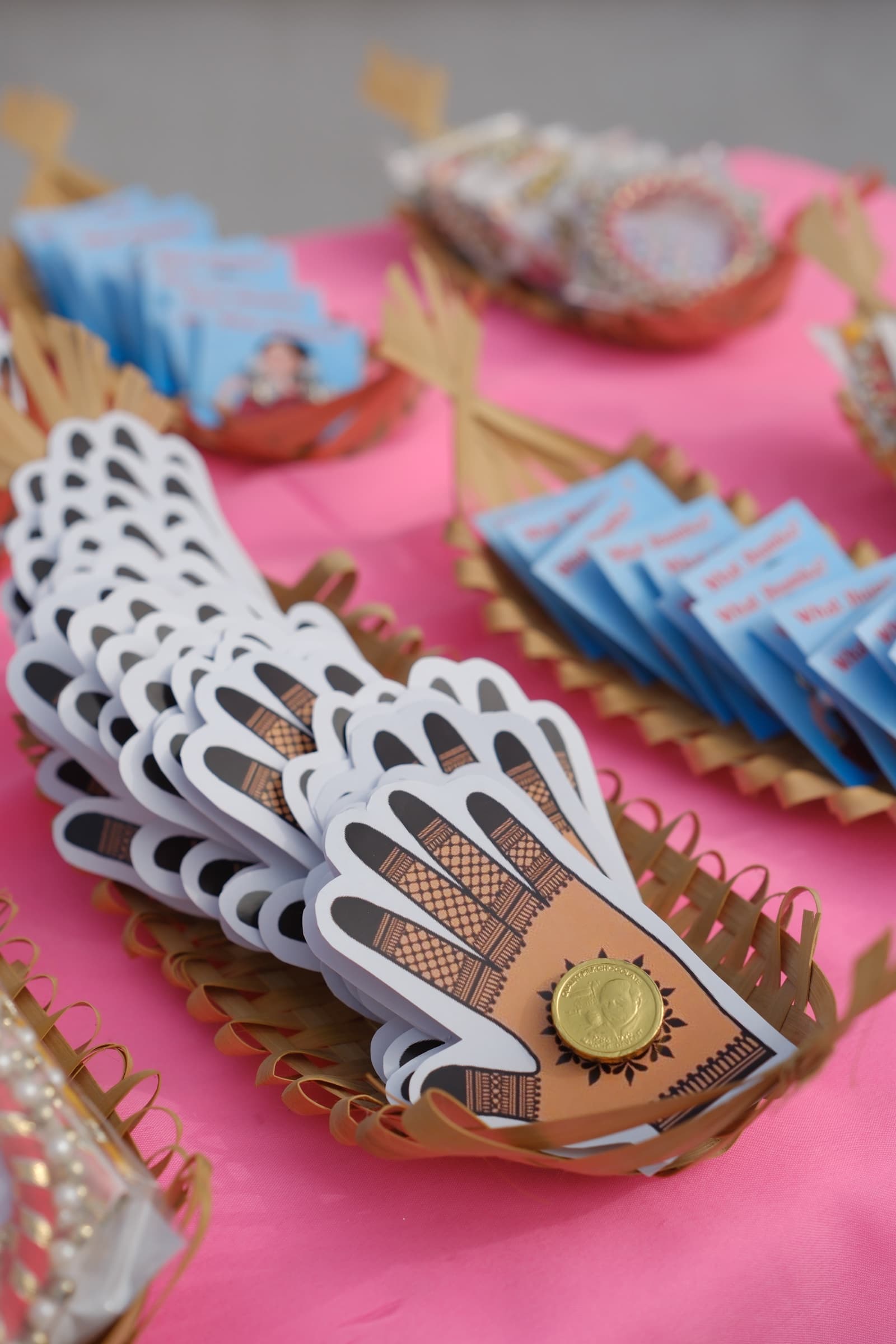 Die-cut mehendi-hand cards with chocolate coins