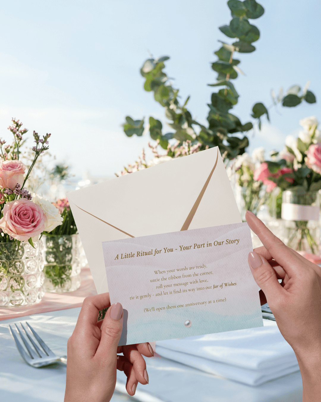 The advice card, A Little Ritual for You, held by a guest at an outdoor table
