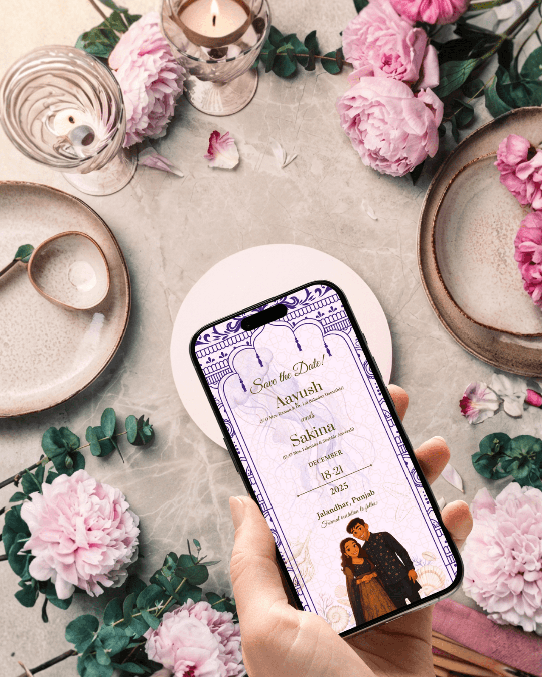 The animated save the date displayed on a phone among peonies and candles